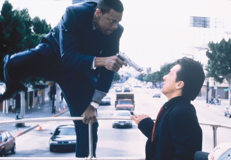 CHRIS TUCKER and JACKIE CHAN in RUSH HOUR, 1998, directed by BRETT RATNER. Copyright NEW LINE CINEMA.